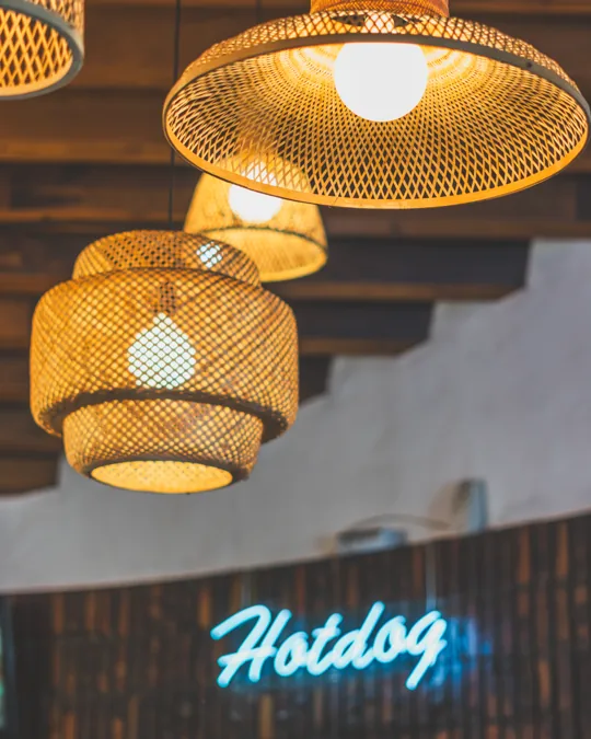 Woven pendant lights inside the diner