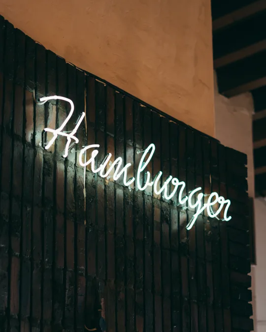 Hamburger neon lettering inside the diner