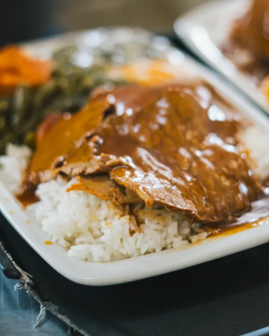 Roast meat with gravy and rice