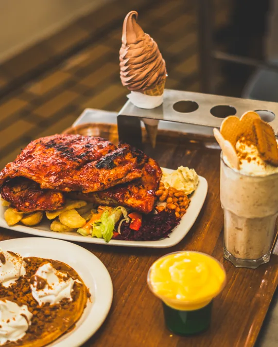 A table of savoury dishes and desserts